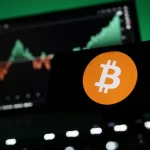 Bloomberg’s McGlone Says Bitcoin’s 2025 Peak Signals Trouble For Metals